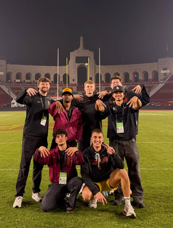 USC football graphic design team at the Los Angeles Memorial Coliseum